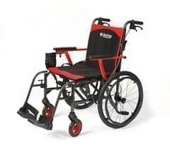 A black and red manual wheelchair with footrests and push handles.
