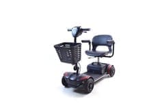 Four-wheeled electric mobility scooter with a front basket and cushioned seat.