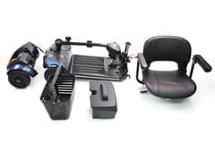 Components of a black adjustable wheelchair armrest set.