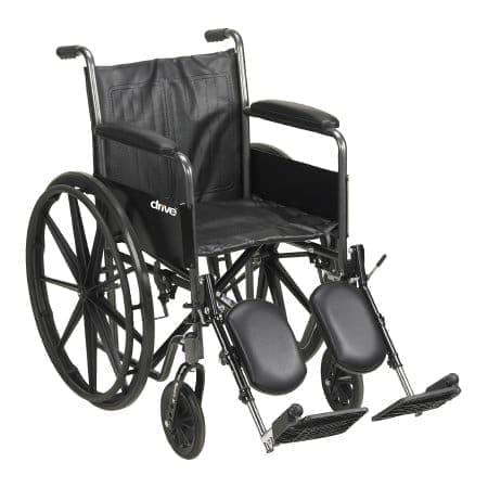 A wheelchair with wheels and foot rests on the front.
