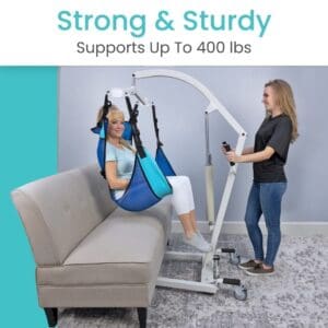 A woman is using the hoist to lift her weight.
