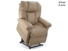A beige recliner with the seat up.