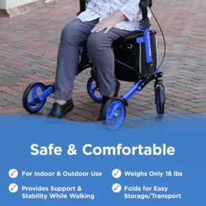 A person comfortably seated in a safe, foldable wheelchair outdoors.