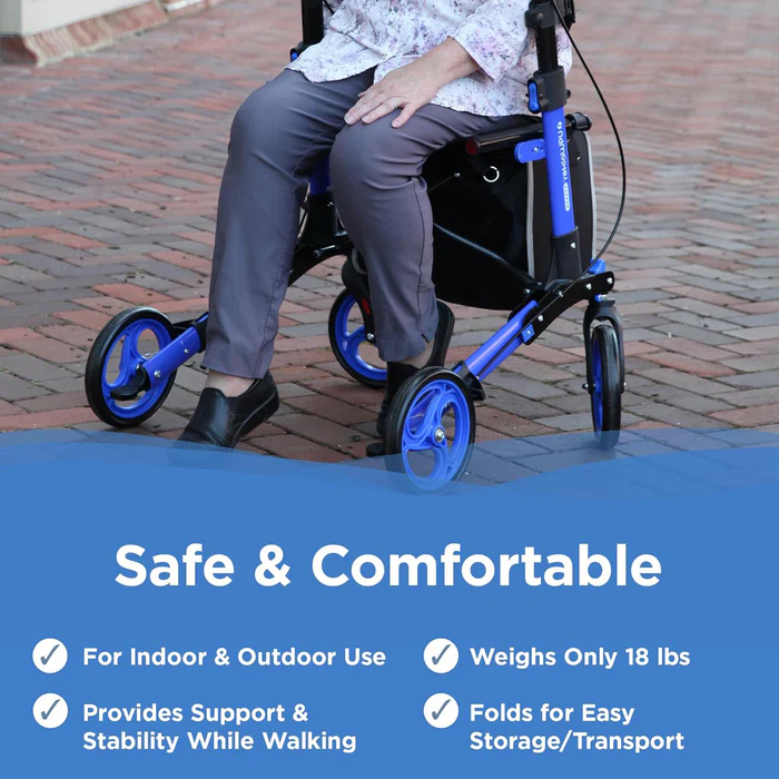 A person comfortably seated in a safe, foldable wheelchair outdoors.