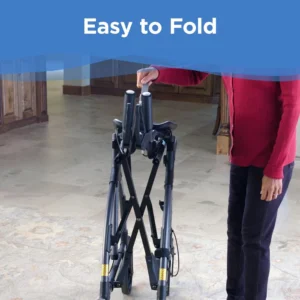 A woman standing next to a folding walker.