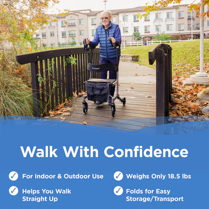 A man with a walker walking on the side of a bridge.