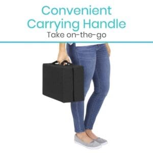 A woman holding a black suitcase in her hand.