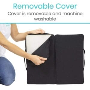 A woman holding onto the cover of her laptop