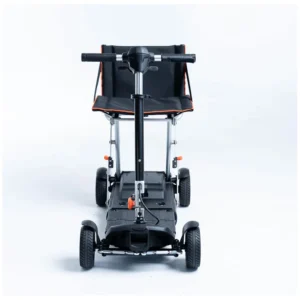 Folded mobility scooter with four wheels and handlebars.