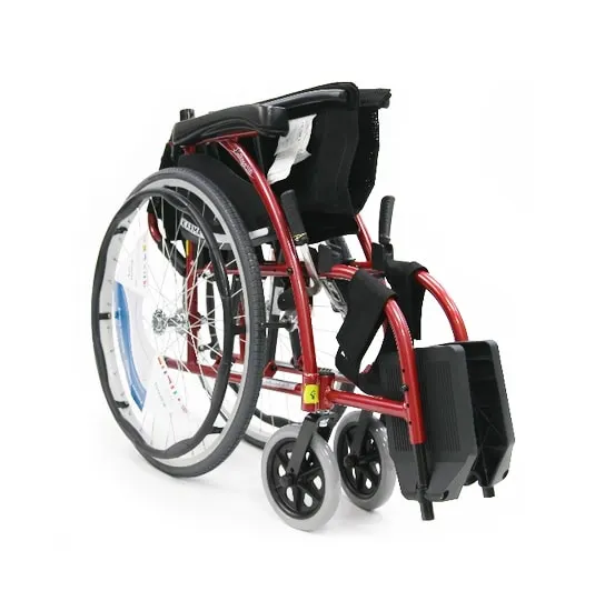 A modern red and black manual wheelchair with footrests and large rear wheels.