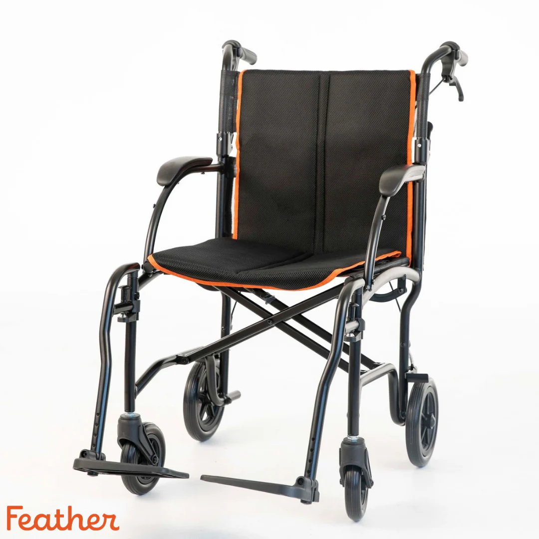 Lightweight black wheelchair with four wheels and armrests.