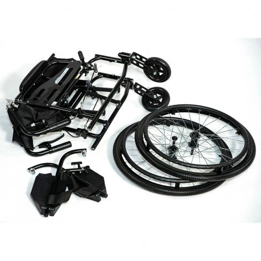 Disassembled black wheelchair parts on a white background.