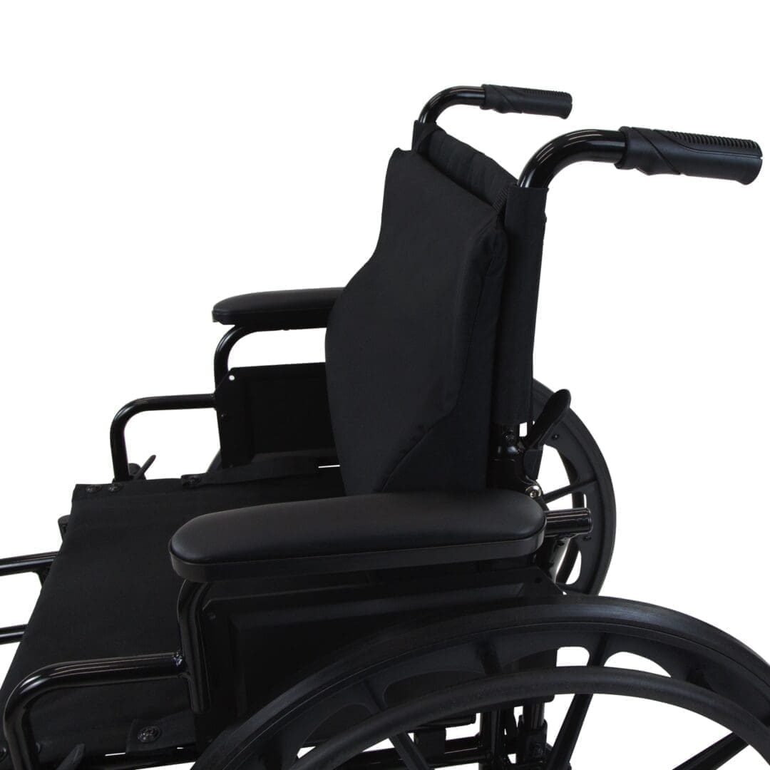 Black manual wheelchair with padded armrests and handles.