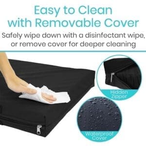 Black removable cover being wiped clean with a cloth.