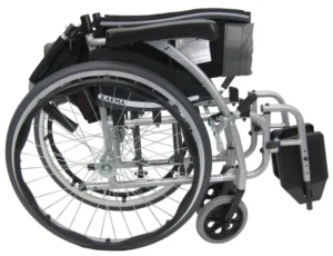 Close-up of a manual wheelchair's wheels and frame.