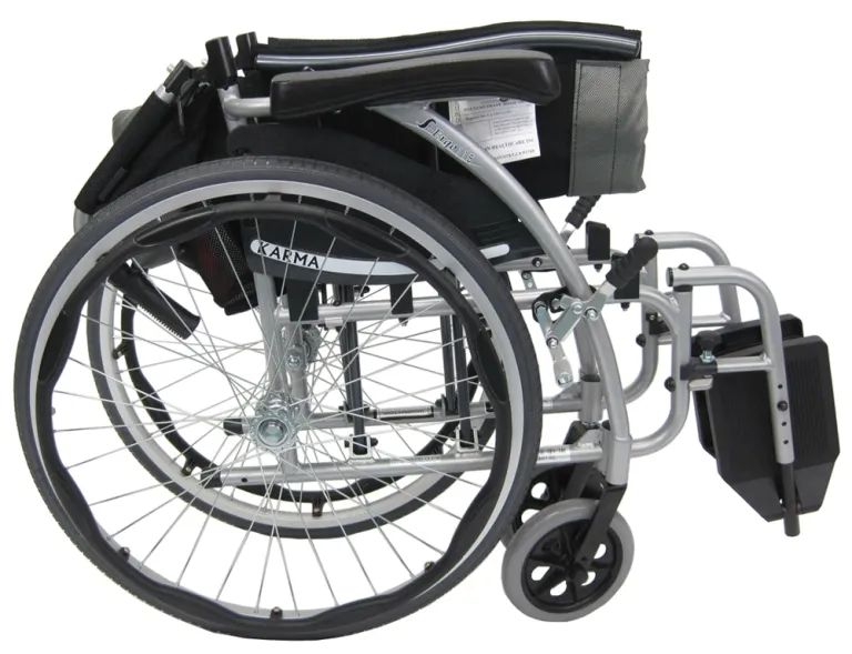 Close-up of a manual wheelchair's wheels and frame.