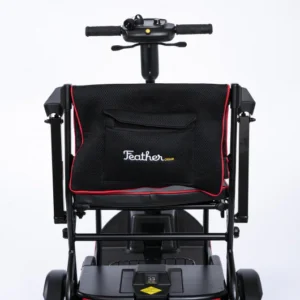 Black mobility scooter with a front storage bag and handlebars.