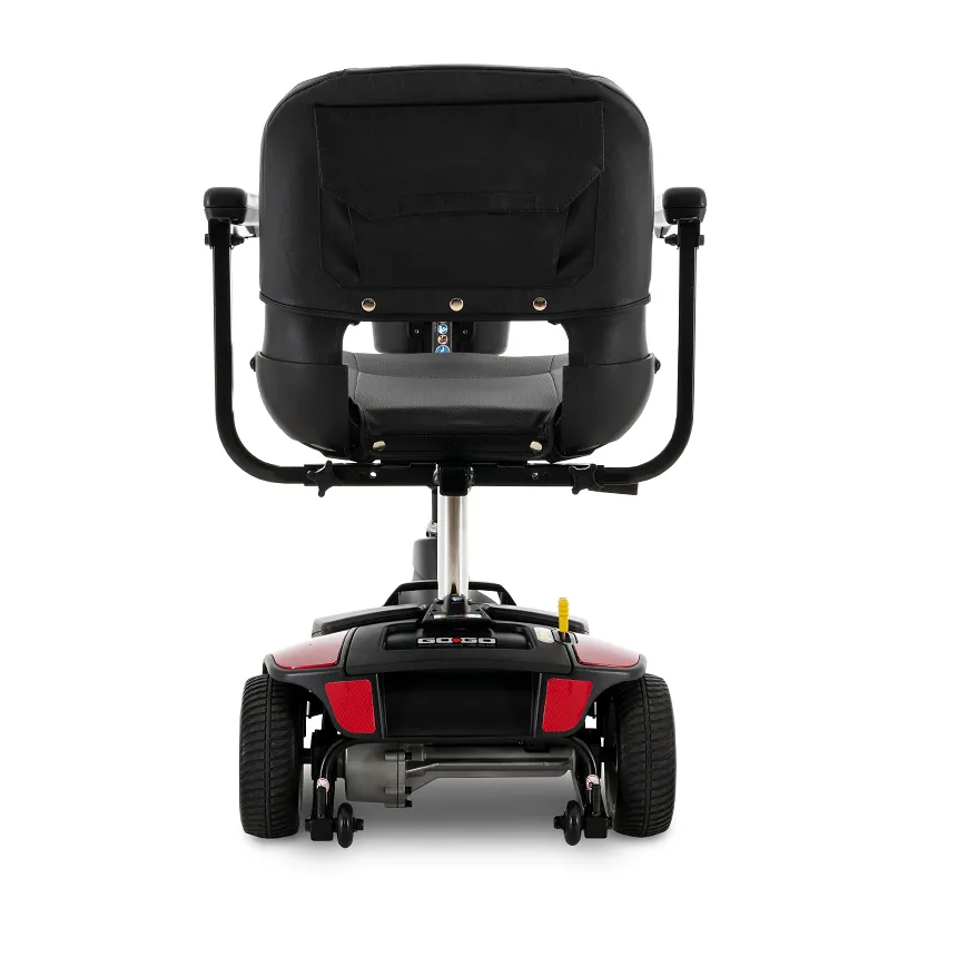 Rear view of a black and red mobility scooter with a padded seat and armrests.