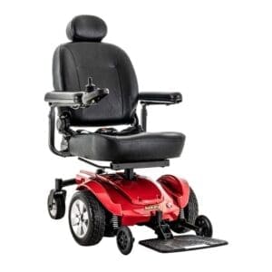 A red electric wheelchair with black cushioned seat and armrests.