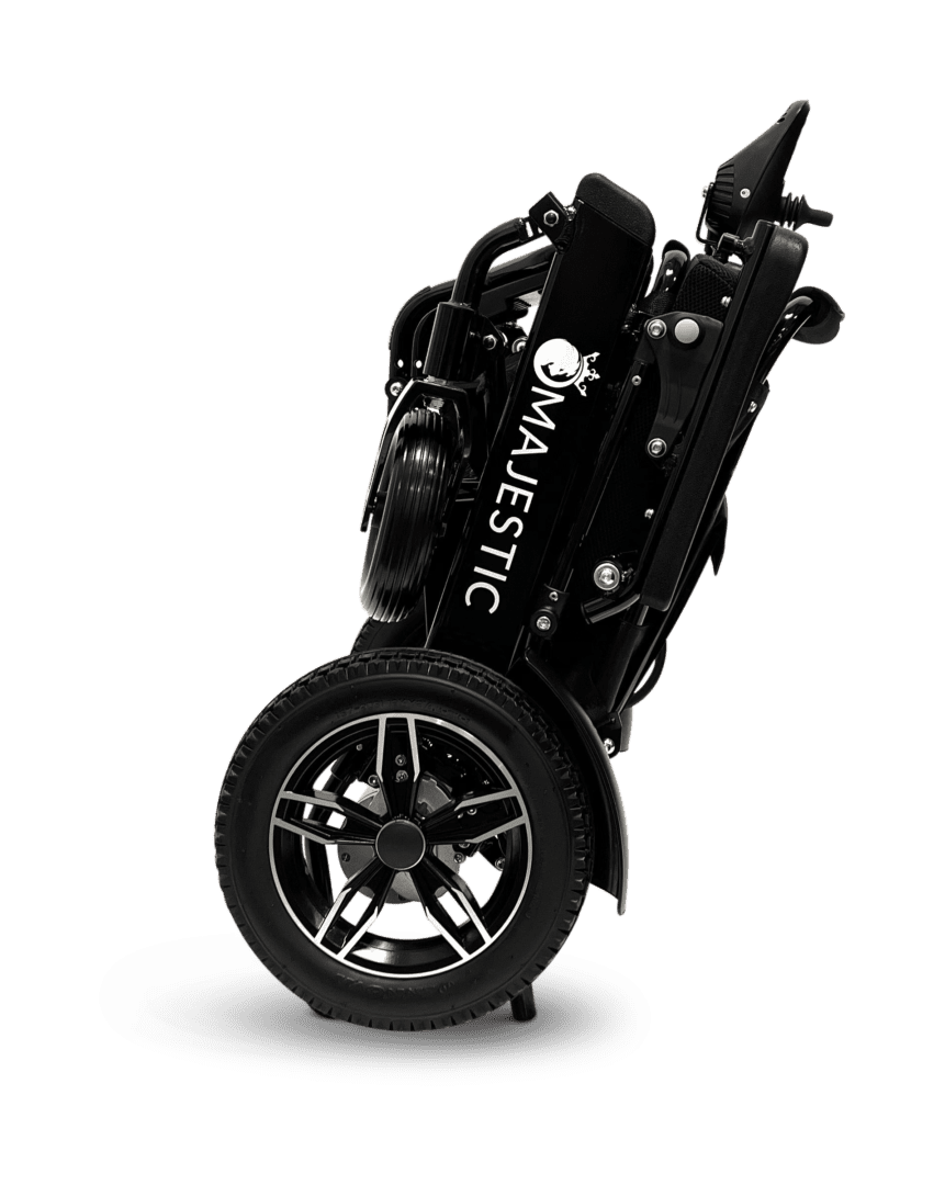 Black golf bag with clubs and a wheel for easy transport.
