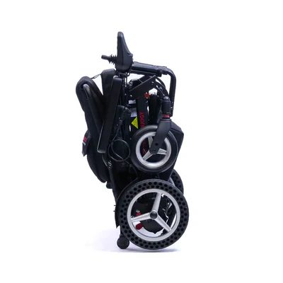 Folded black stroller with large wheels.