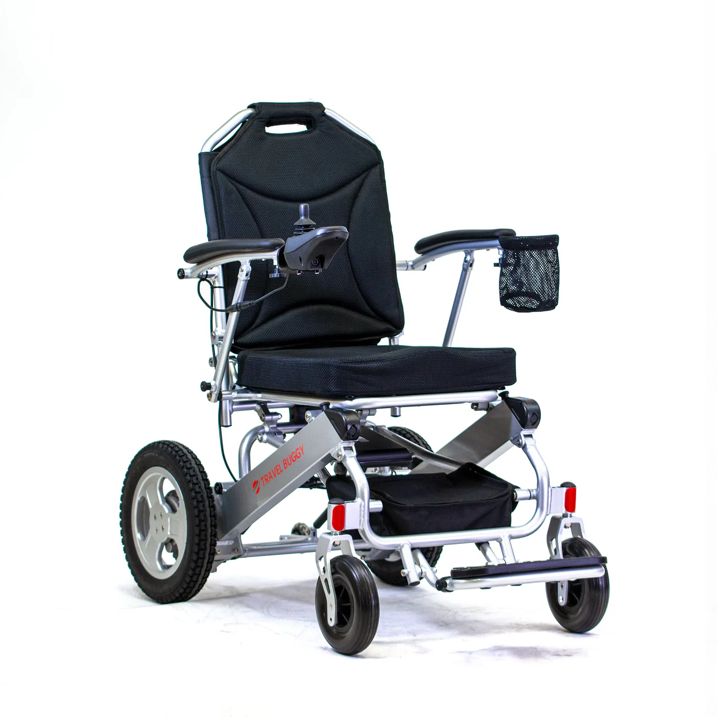 Compact electric wheelchair with sturdy wheels and cup holder.