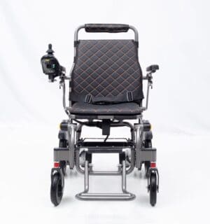 Modern electric wheelchair with black cushioned seat and joystick control.