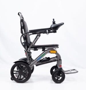 Compact black mobility scooter with three wheels and ergonomic seat.