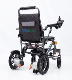 Modern electric wheelchair with sturdy frame and adjustable features.
