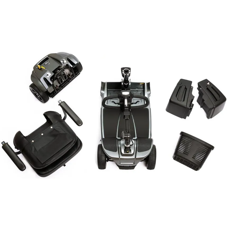 Disassembled black handheld electronic device with various parts laid out.