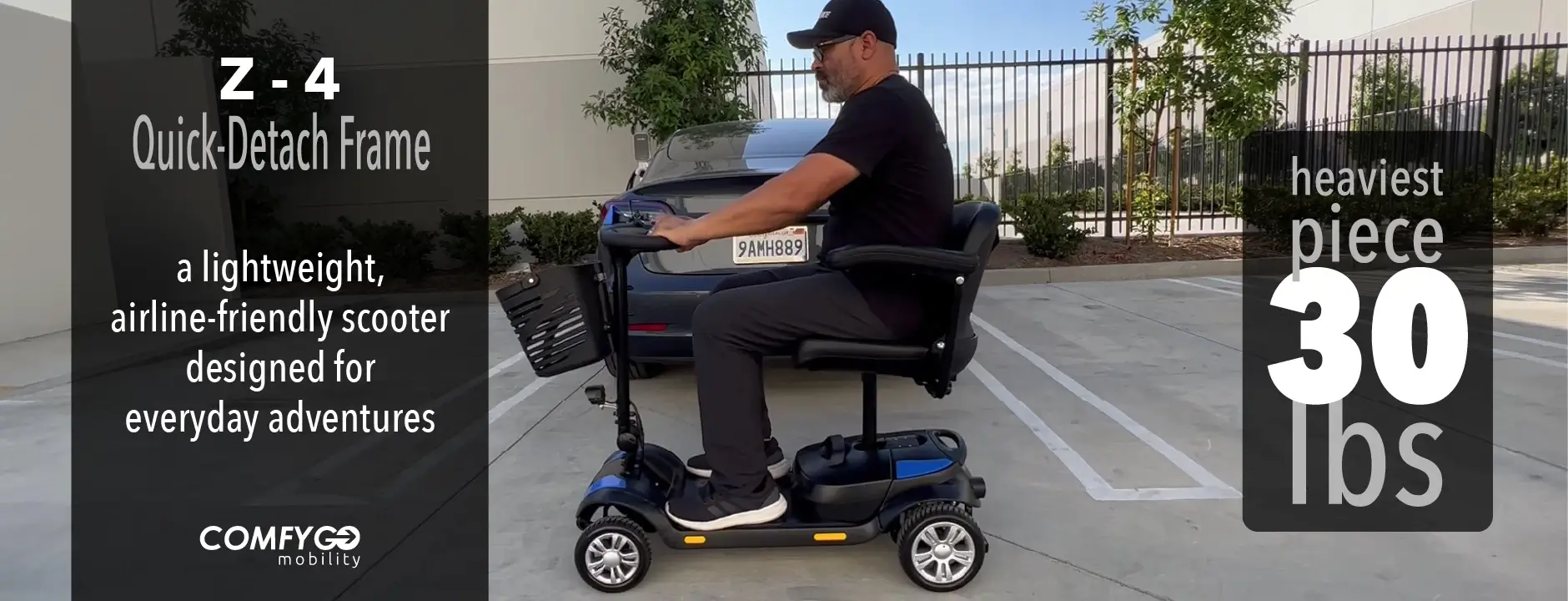 Man riding a mobility scooter in a parking lot.