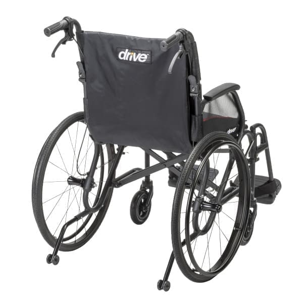 A lightweight, foldable wheelchair with black fabric and metal frame.