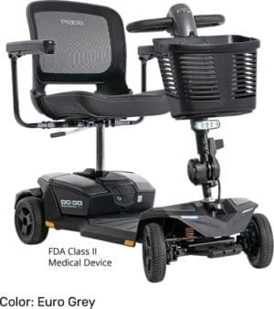 Compact black mobility scooter with basket and armrests.