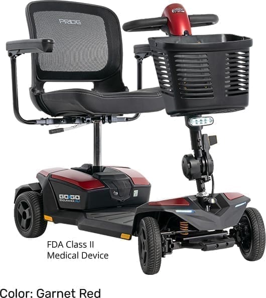 A sleek, black four-wheel mobility scooter with a front basket and adjustable armrests.
