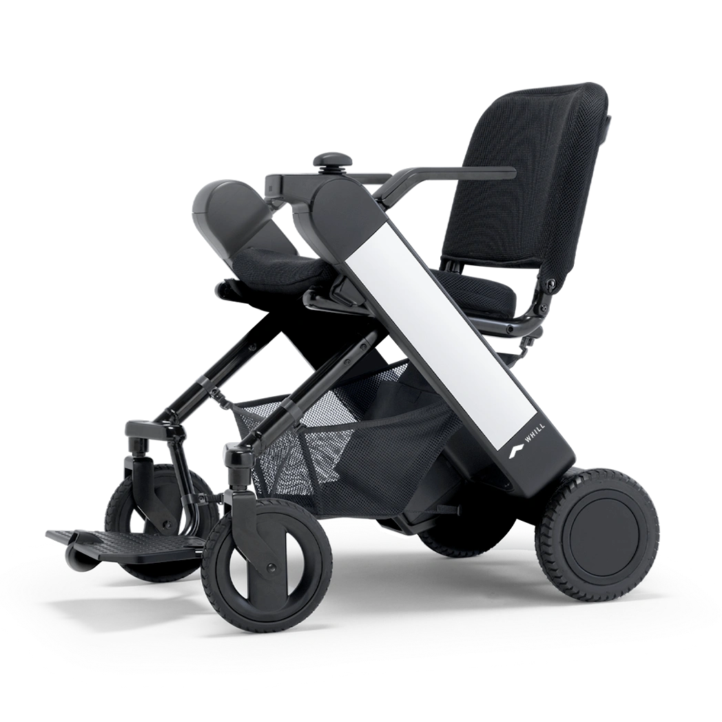 Modern electric wheelchair with sleek design and large wheels.