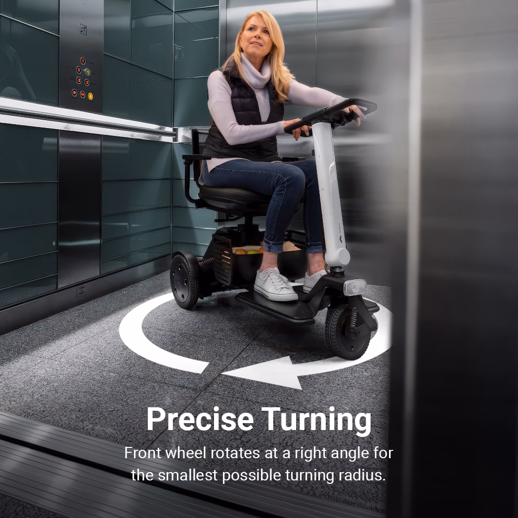 Woman using a floor scrubber with precise turning capability.