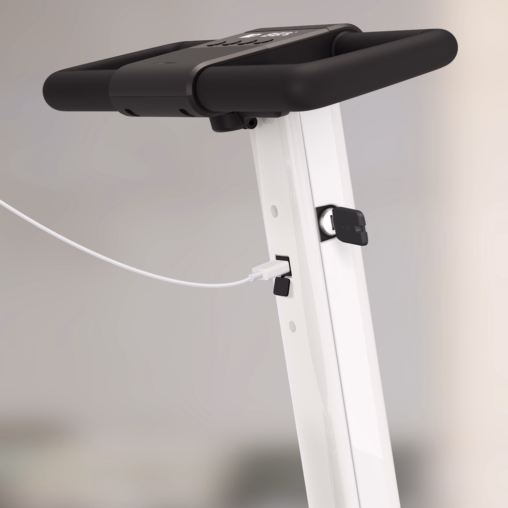 Close-up of a white treadmill handle with a charging cable plugged in.