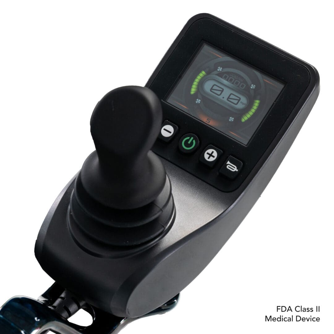 Close-up of a joystick control panel with a digital display screen.