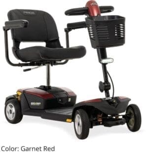 A compact, black mobility scooter with four wheels and a front basket.